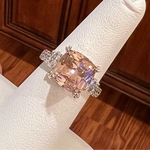 Elegant Pink Cushion-Cut Ring with Side Stones
